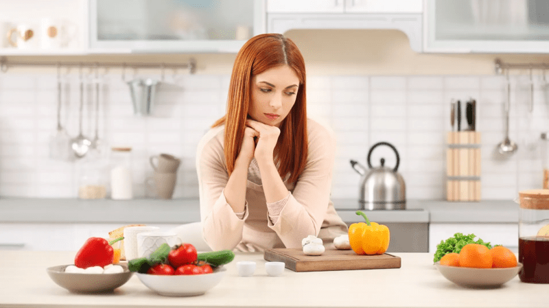 Doamnă în bucătărie