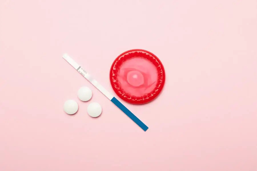 condom-pills-and-pregnancy-test