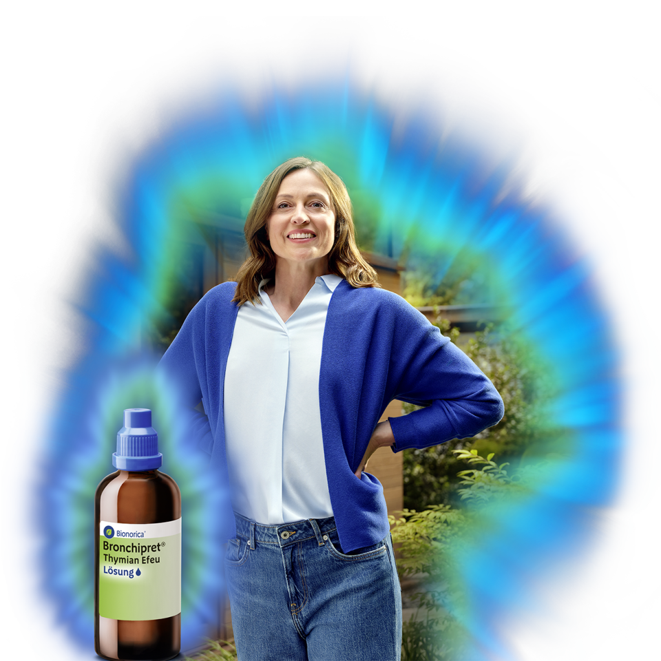 Frau & Bronchipret Flasche umgeben von einem grün-blauen Glow